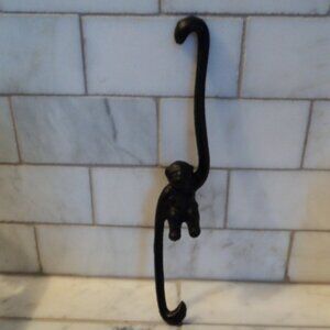 vintage cast iron monkey hook